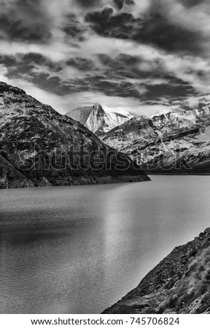 beautiful mountain landscape. Swiss alps with a dam  Grande Dixence Dam  . black-and-white image landscape.