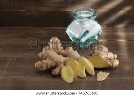 ginger and baking soda with wooden background