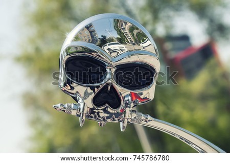 Handlebar brake. View mirror in the shape of a skull