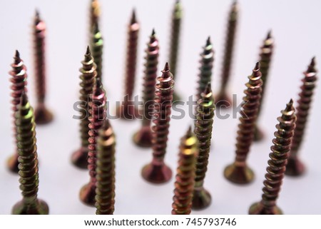 tapping screws made od steel, metal screw, iron screw, chrome screw, screws as a background, wood screw with isolated white background