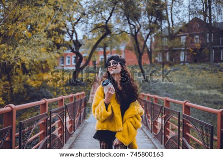 Pretty young brunette girl make selfie on the street. outdoor hipster portrait, happy face, sunglasses, smile, hot coffee, morning drinking, autumn atmosphere moods