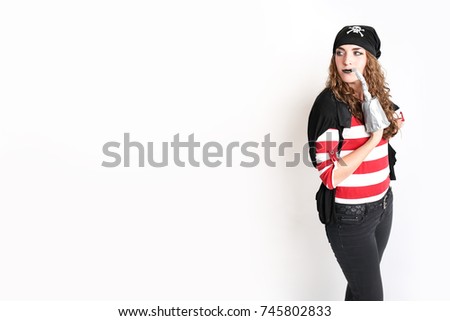 Woman dressed up in festive pirate costume
