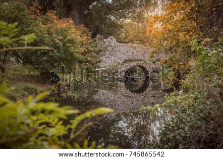 The Garden of Ninfa is a landscape garden in the territory of Cisterna di Latina, in the province of Latina, central Italy.In this picture the beautiful stone bridge that cross the Ninfa river.
