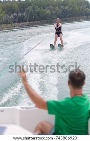 young woman water skiing