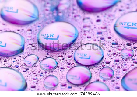 "Enter" in water drops. Close-up od studo shot.