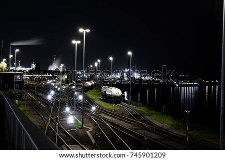 Industrial train yard at night