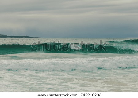 Breaking beautiful ocean wave - minimalist landscape, nothing but ocean and sky with copy space