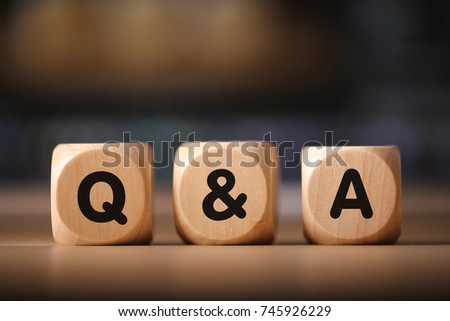 Close-up Shot of Q and A wooden blocks. Royalty-Free Stock Photo #745926229