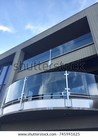 semicircle glass balcony Royalty-Free Stock Photo #745941625