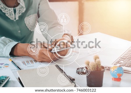 Businesswoman hand using smart phone,laptop, online banking payment communication network with virtual graphic icon diagram.