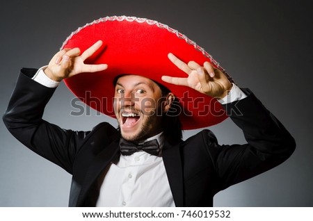 Young mexican man wearing sombrero