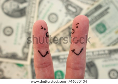 Fingers art of couple on background of money.  Concept of man and woman yelling at each other. Royalty-Free Stock Photo #746030434