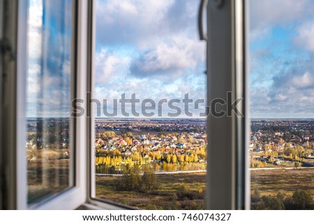 Metal-plastic windows overlooking the landscape