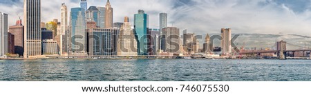 Wonderful panoramic view of New York skyscrapers on a sunny day.