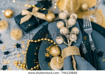 Christmas table setting with gift
