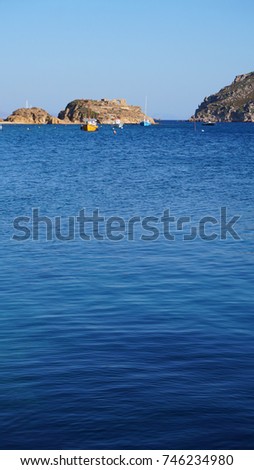  Photo from clear water seascape of Groikos in island of Patmos, Dodecanese, Greece                       