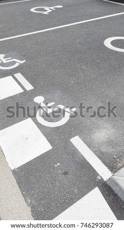 sign road reserved parking space for disabled people