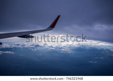 cloud formation from plane. motion blur due to flight shaking