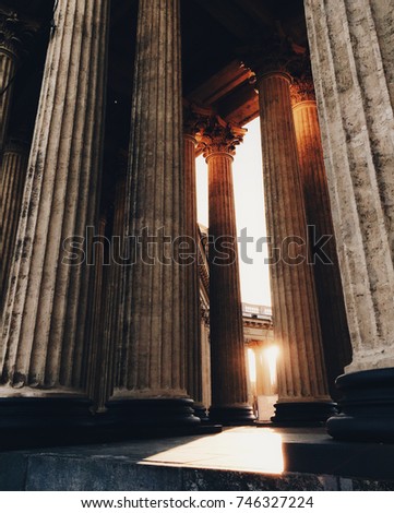 Ancient columns and beautiful sunshine through them. Old building. Architectural monument. Historic attraction. Famous building, image outdoors