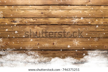 winter wooden background with snowflakes  Royalty-Free Stock Photo #746375251