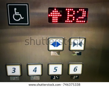 Handicap sign on elevator button