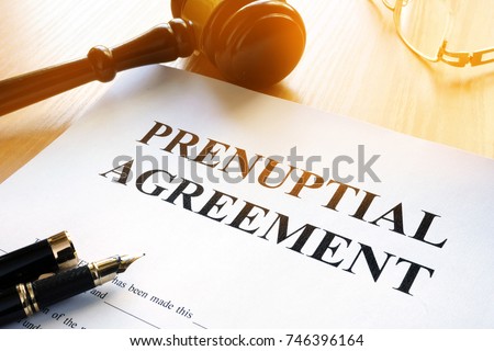 Prenuptial Agreement on a table. Royalty-Free Stock Photo #746396164