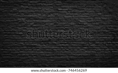 Black brick wall texture, brick surface for background. Royalty-Free Stock Photo #746456269