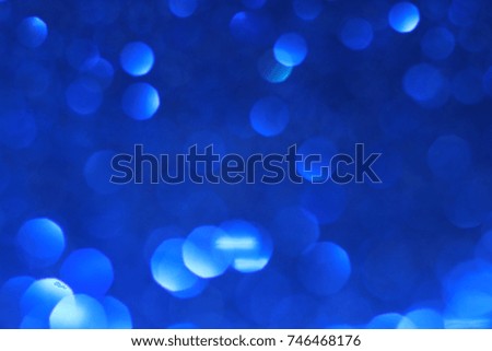 Glitter abstract blue bokeh light background