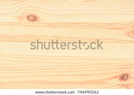 A wooden texture with knots. A new wooden board. A sign for the inscription. A wooden shield.