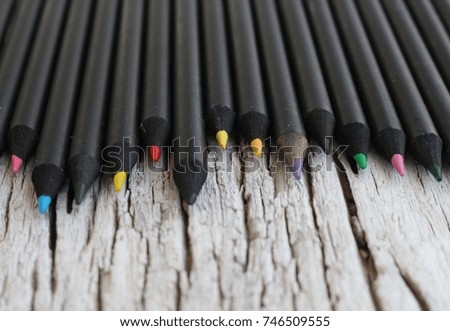 color pencils line up background on classic wood