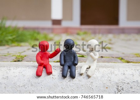 Human clay figures. Society scene.