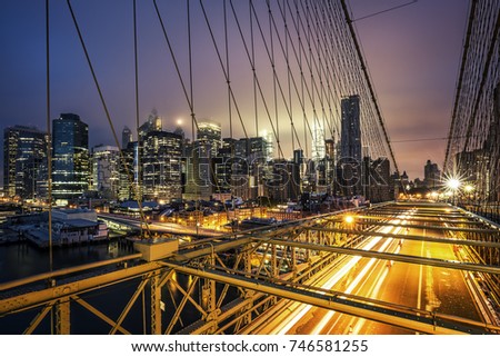 View of Brooklyn Bridge at sunset, NYC.