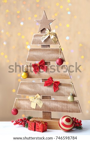 Christmas tree on lights background