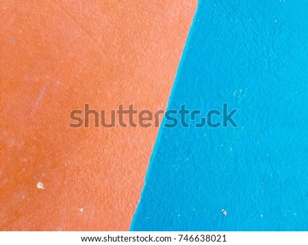 Orange with blue color concrete floor texture