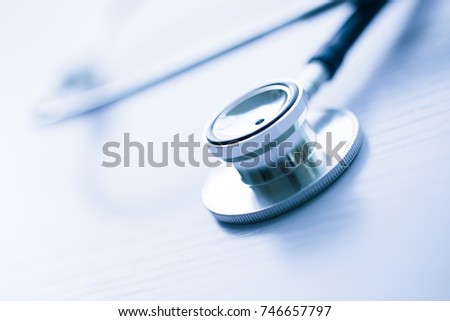 Close-up shot of stethoscope on table.