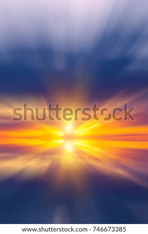 Sunset over the sea with bright sun rays. Abstract dawn composition