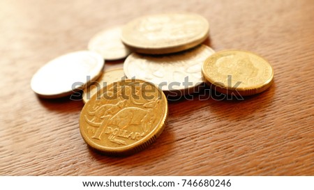 Australia Dollars and Cents Coins on the wooden table