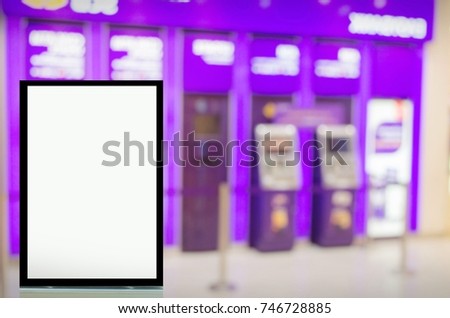 advertising billboard or blank showcase light box for your text message or media content in front of ATM (Automated teller machine) banking machine at bank, commercial and marketing concept