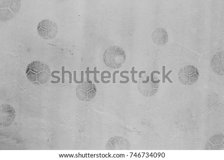 football print on cement background,soccer slough on wall