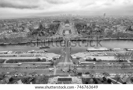 Paris aerial skyline with Seine river on a cloudy winter day, France.