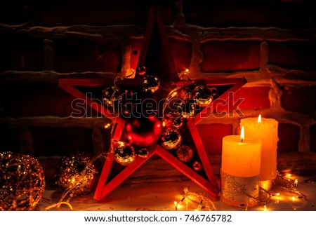New Year background with Christmas tree toys and candles. Star