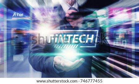 Fintech financial Internet Concept : Business man hold fintech technology for finance service ,technology abstract background