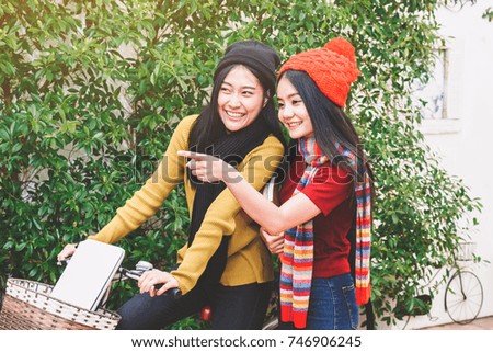 Happy meeting of two woman student
