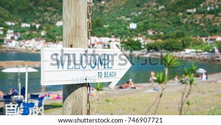 Welcome sign at beach
