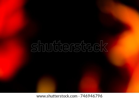Abstract light flares on the black background for designers and retouch to apply in screen regime to compose the picture. 