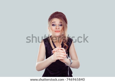 Thank you. Closeup portrait young woman gesturing with clasped hands, pretty please with sugar on top isolated light blue background. Human emotion facial expression feeling signs symbol body language