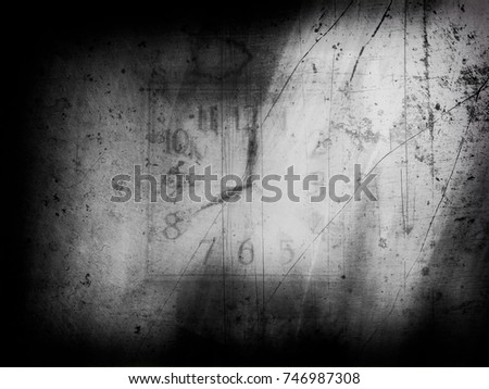November 16, 2016, Trnava, Slovakia
The black and white illusion of measuring time. Clocks are embedded in a background that is scratched by lines and smudges. Dark shadows come in from the edges.