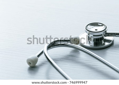 Close-up shot of stethoscope on table.