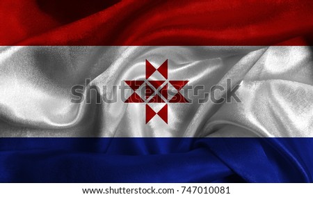 Realistic flag of Mordovia on the wavy surface of fabric. This flag can be used in design.