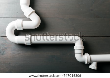 white plastic sewerage water pipes Royalty-Free Stock Photo #747016306